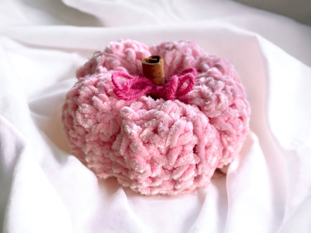Plush Pink pumpkin decorative with cinnamon stick stem for touch of warmth
