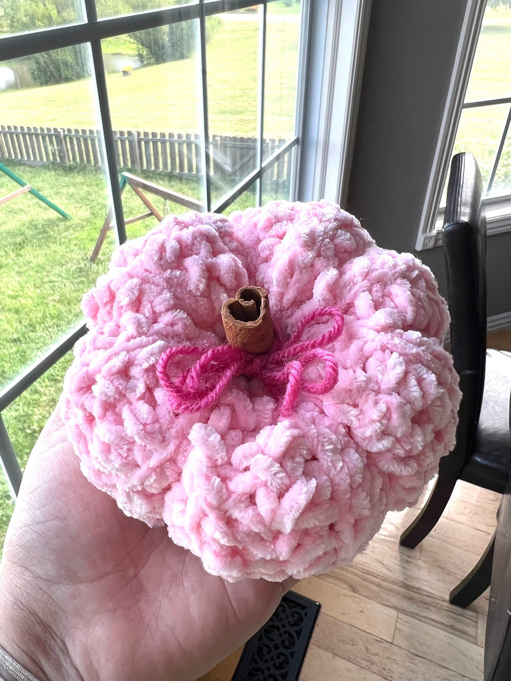 Plush Pink pumpkin decorative with cinnamon stick stem for touch of warmth