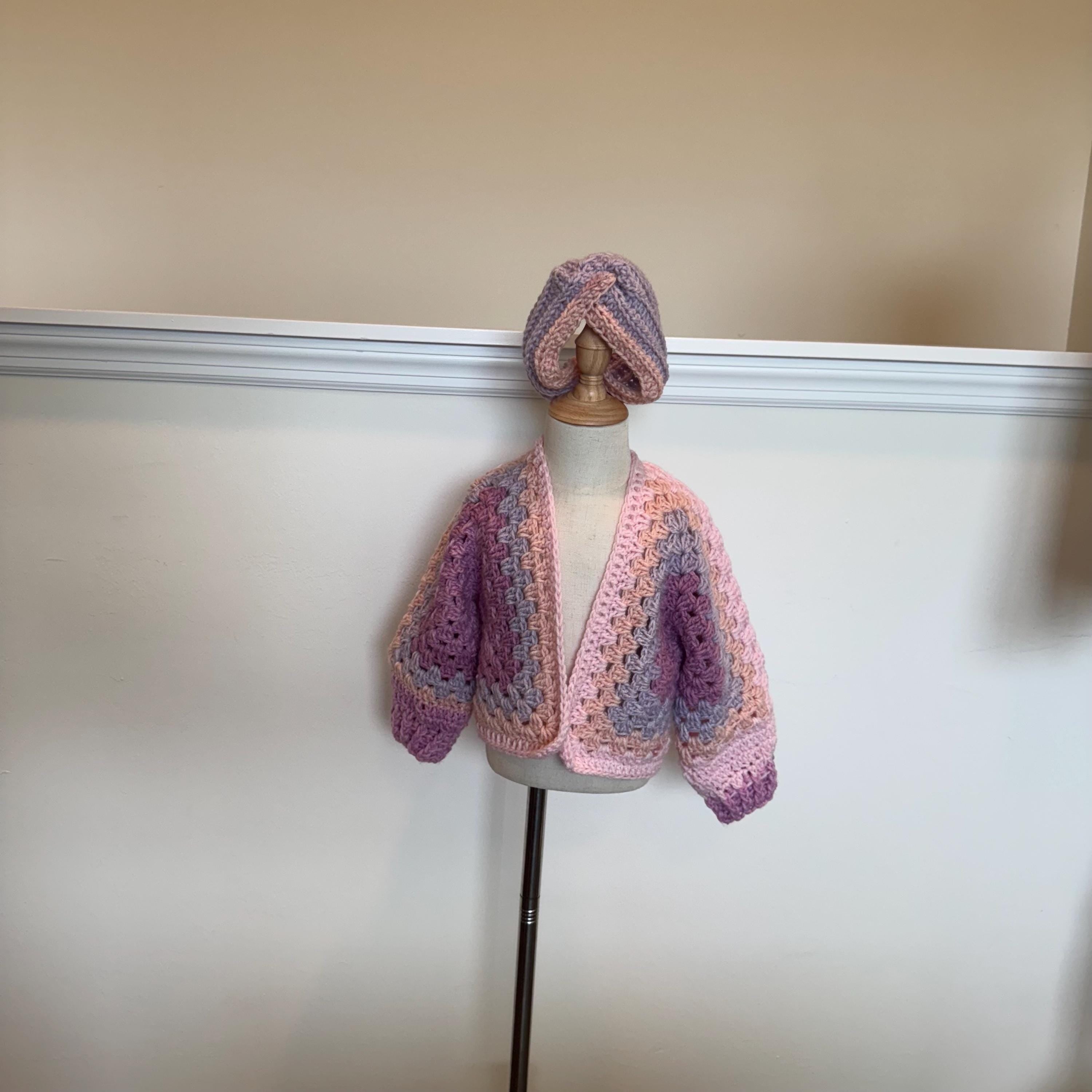 Vintage Style Clothing Toddler Crochet Cardigan Girl Outfit Set Pink Headband Accessory Fall Weather Layering Piece Handmade Gift Child Sweater Granny Stitch Hexagon Design Beautiful Colors White Purple Blend Perfect Special Occasion Ready